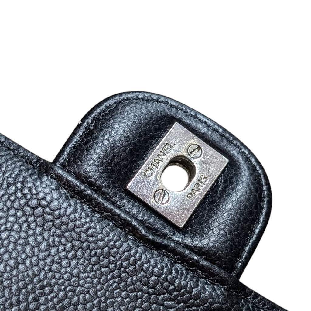 Chanel Classic Double Flap Bag — Black Caviar & Silver Hardware