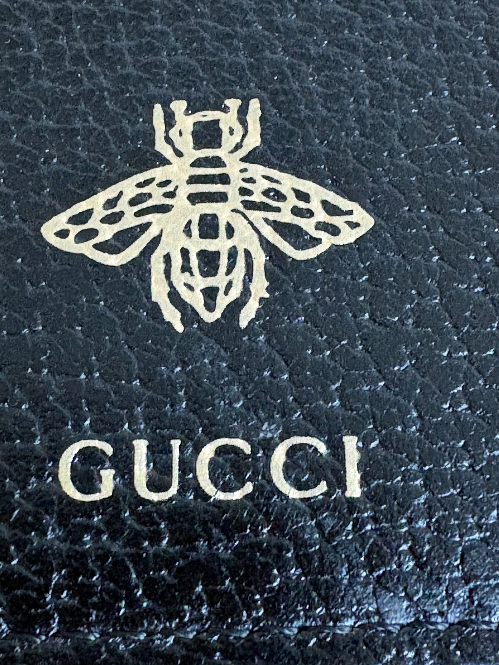 Gucci Bee & Star Embossed Leather Wristlet Clutch — Black